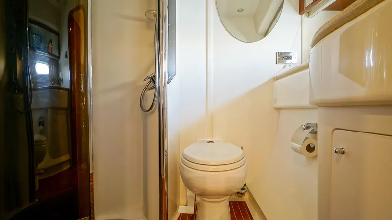 Slide: The Image of Bathroom interior of 2002 Viking Princess 68 yacht with shower and toilet. - 37