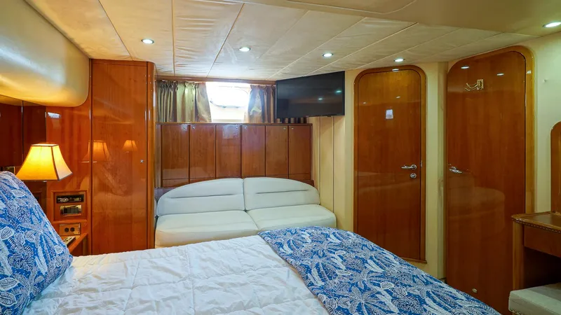 Slide: The Image of Luxurious cabin interior of 2002 Viking Princess 68 Sport Cruiser yacht. - 47