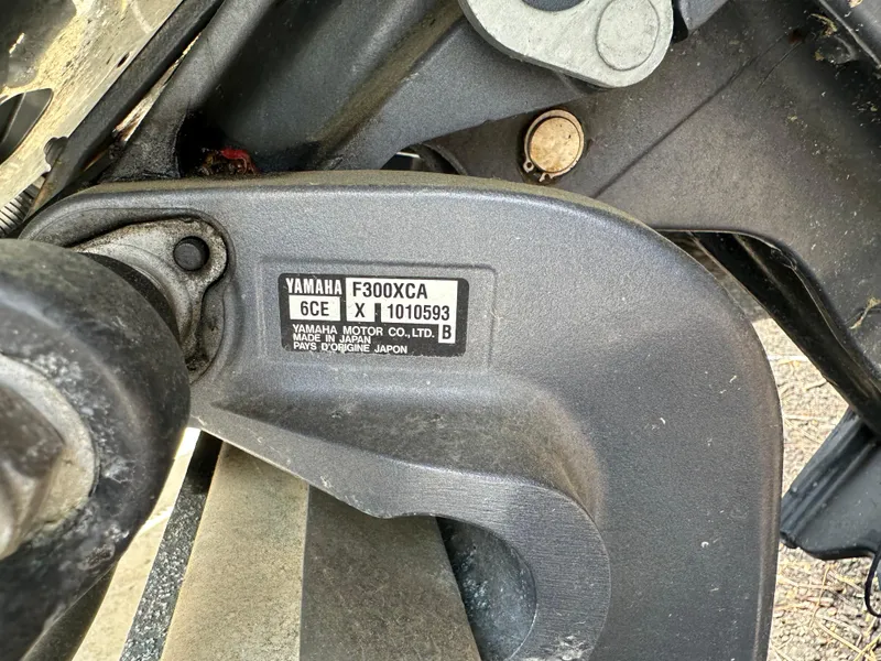 Slide: The Image of Close-up of a Yamaha F300XCA motor on a 2014 Scout 245 Dorado boat. - 17