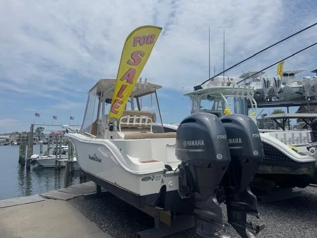 The Image of 2020 NauticStar 2602 Legacy boat for sale with twin Yamaha engines at marina. - 0
