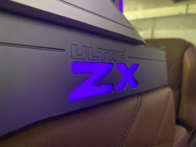 Slide: The Image of 2025 Tigé Ultré 25ZX interior detail with illuminated ZX logo. - 10