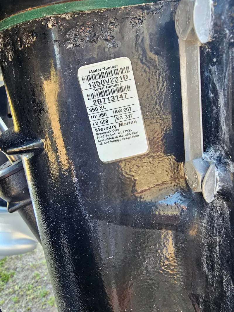 Slide: The Image of Label on a Mercury Marine engine, model 350 XL, with serial number details. - 5