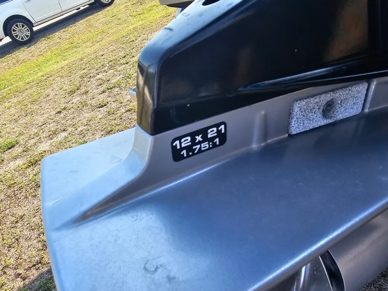 Slide: The Image of Close-up of a Triton 301 CC 2010 boat part with gear ratio label. - 8