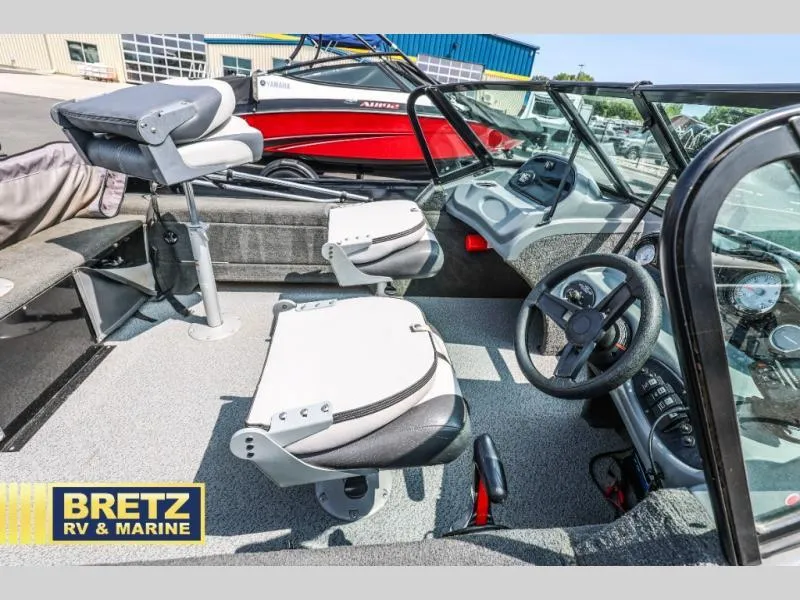 Slide: The Image of 2019 PRO ANGLER 162 boat interior with steering wheel and seating at Bretz RV & Marine. - 8