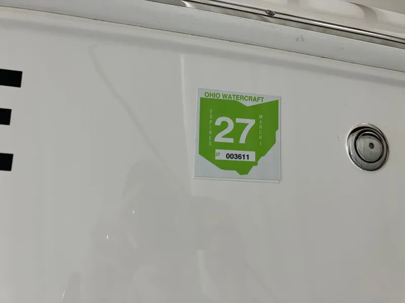 Slide: The Image of Ohio watercraft sticker on 2021 Robalo R242 Center Console boat. - 37