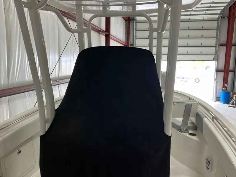 Slide: The Image of 2021 Robalo R242 Center Console boat interior in storage facility. - 38