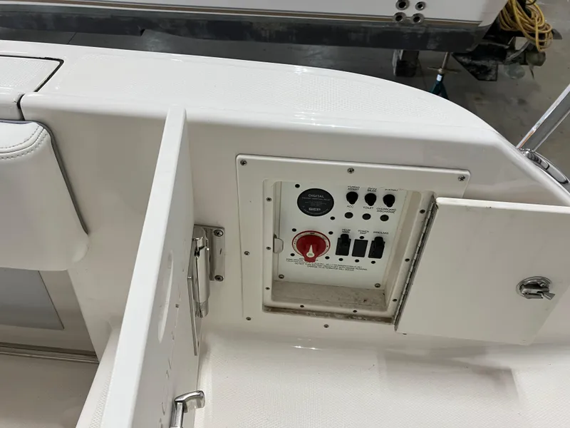 Slide: The Image of Control panel on a 2021 Robalo R242 Center Console boat. - 46