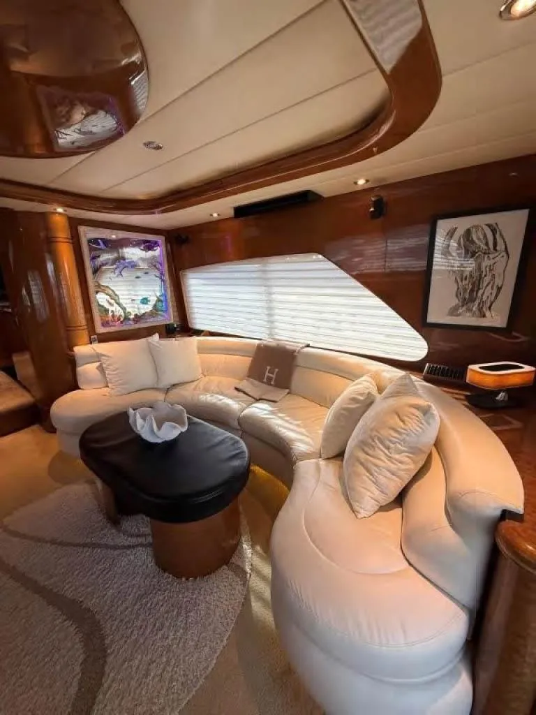 Slide: The Image of Luxurious interior of a 2000 Horizon E 65 yacht with elegant seating and decor. - 36
