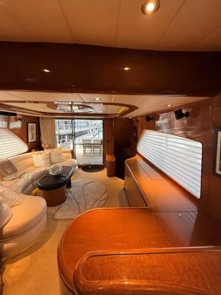 Slide: The Image of Luxurious interior of a 2000 Horizon E 65 yacht with elegant wood finishes. - 37