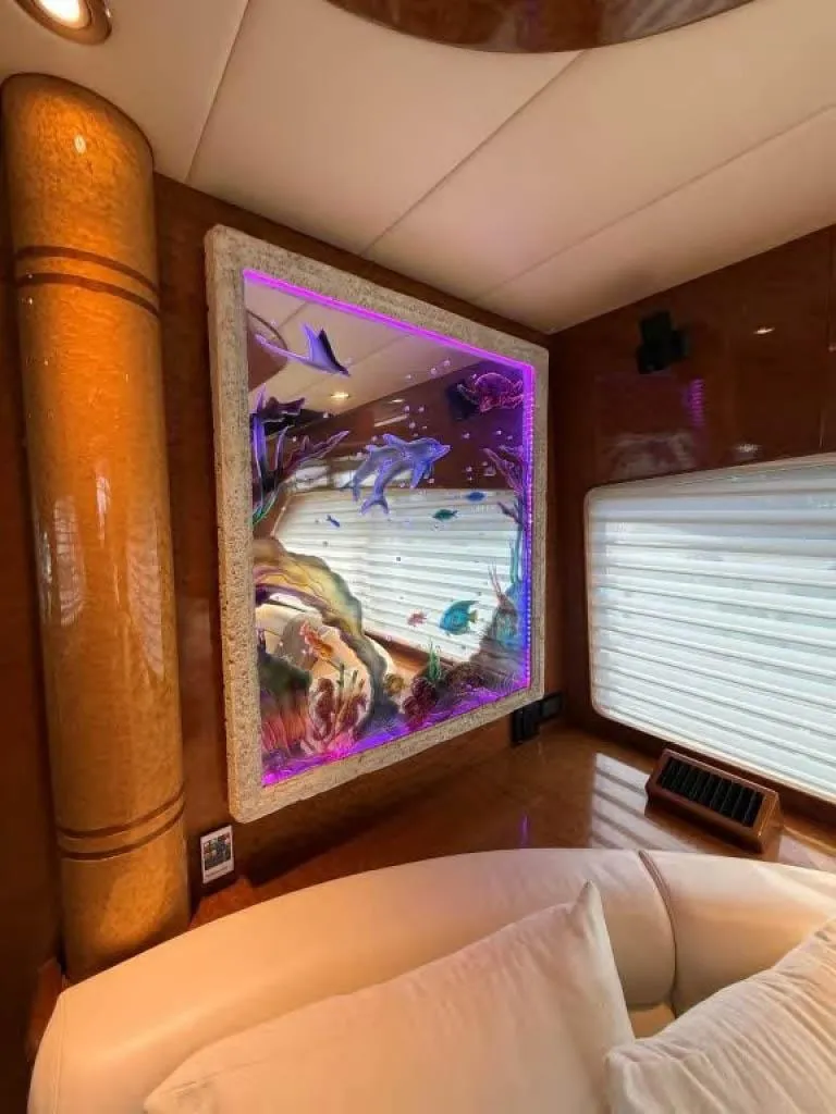 Slide: The Image of Luxurious yacht interior with illuminated marine-themed artwork, Horizon E 65, 2000 model. - 38