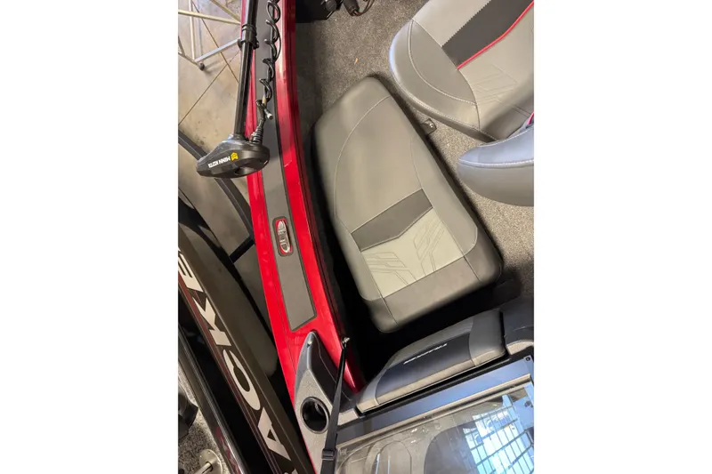 Slide: The Image of 2025 Tracker Targa V-19 Combo interior with seats and Minn Kota trolling motor. - 17