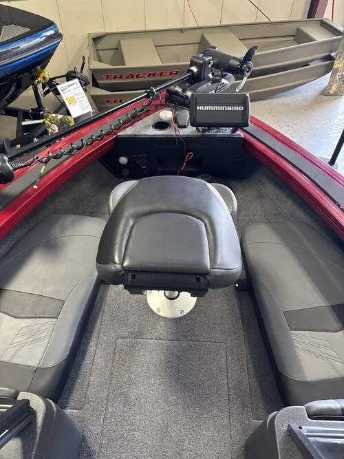 Slide: The Image of 2025 Tracker Targa V-19 Combo dashboard with steering wheel and Humminbird display. - 6