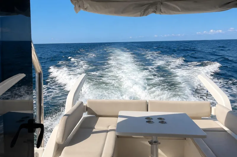 Slide: The Image of Aquila 44 Yacht 2016 cruising on open sea, view from deck seating area. - 10