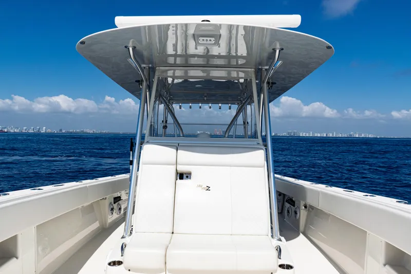 Slide: The Image of 2019 SeaVee 390Z boat on open ocean with clear blue sky. - 22