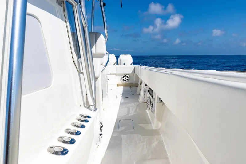 Slide: The Image of 2019 SeaVee 390Z boat deck with ocean view, clear sky, and modern design. - 27