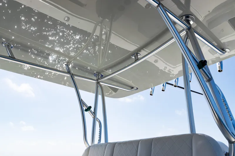 Slide: The Image of 2019 SeaVee 390Z boat interior with sleek metal framework and cushioned seating. - 35