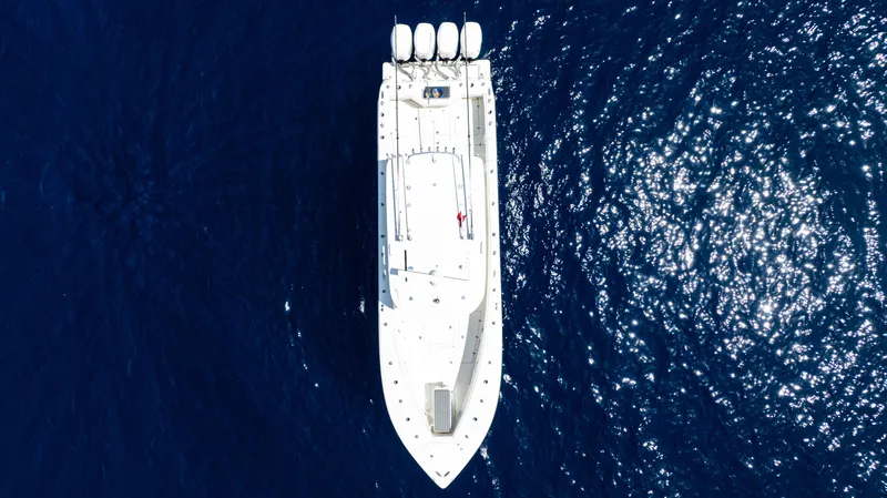 Slide: The Image of Aerial view of 2019 SeaVee 390Z boat on deep blue ocean water. - 8