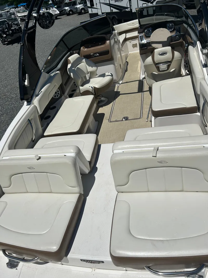 Slide: The Image of 2016 Chaparral 257 SSX boat interior with spacious seating and modern design. - 10