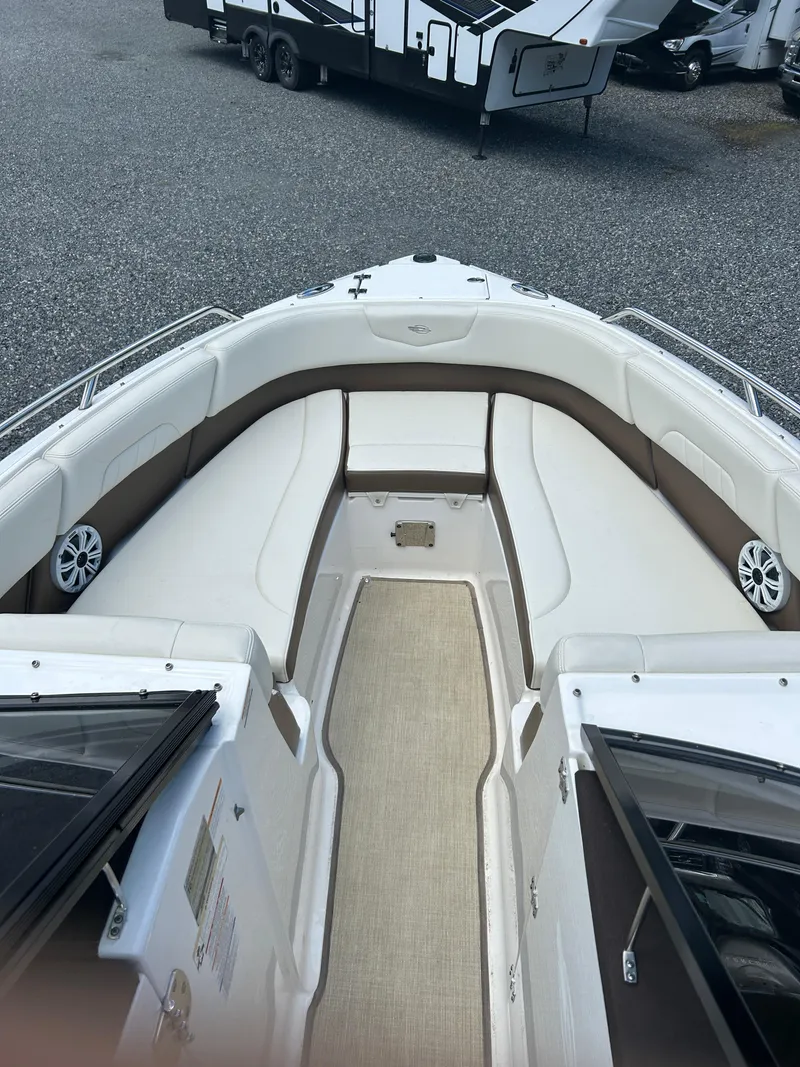 Slide: The Image of 2016 Chaparral 257 SSX boat interior with spacious seating and modern design. - 19