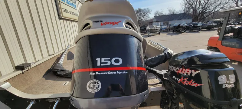 Slide: The Image of 2004 Sylvan F 1800 AVENGER boat with Yamaha and Mercury outboard motors. - 8