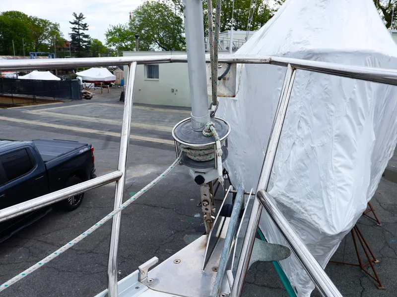 Slide: The Image of Bow of a 1999 Beneteau 361 sailboat with furling system, docked outdoors. - 10