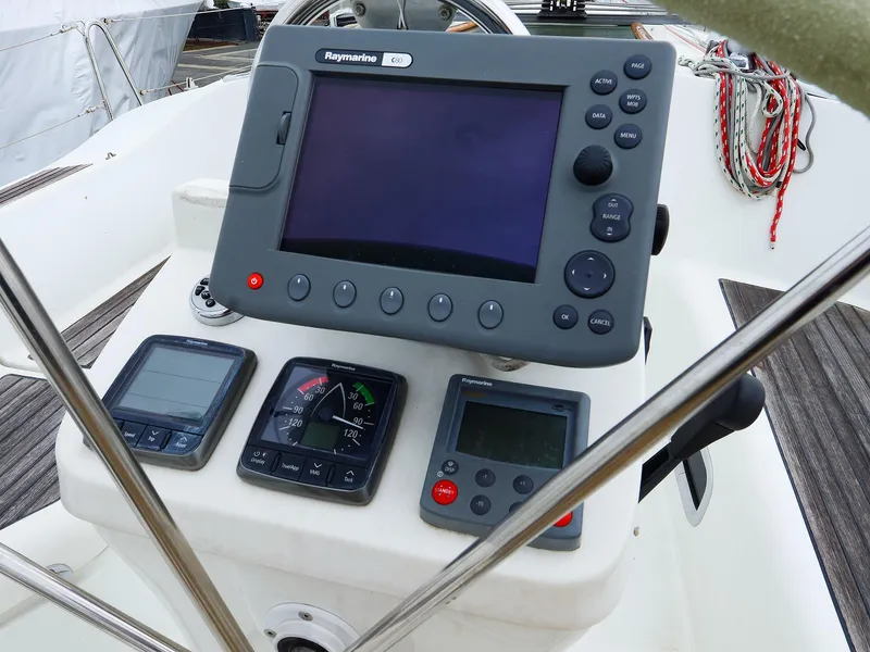 Slide: The Image of Cockpit of 1999 Beneteau 361 sailboat with Raymarine navigation equipment. - 11