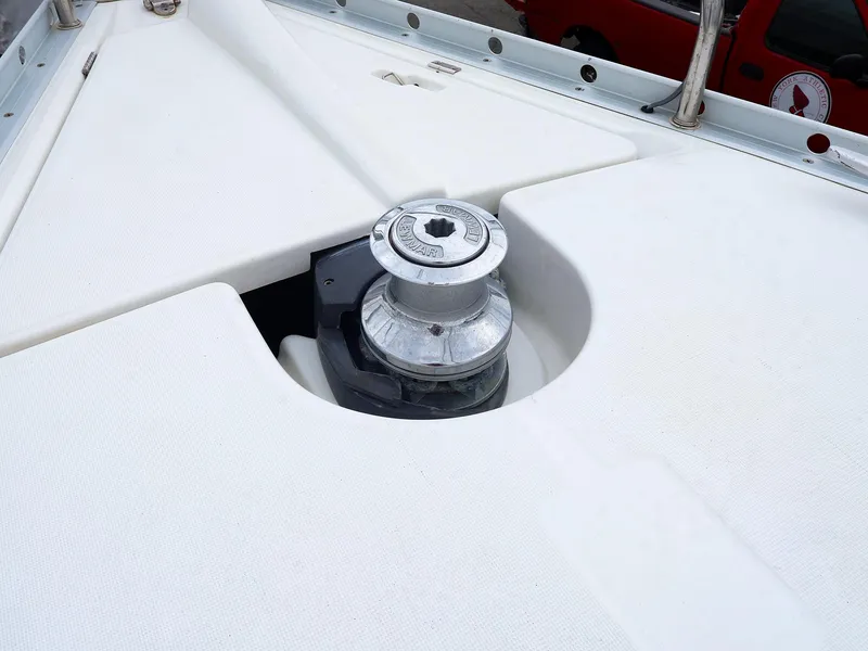 Slide: The Image of Winch on deck of 1999 Beneteau 361 sailboat, showcasing sleek design and functionality. - 15