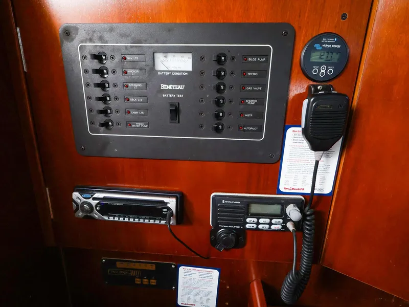 Slide: The Image of Control panel of a 1999 Beneteau 361 sailboat with radio and navigation equipment. - 33