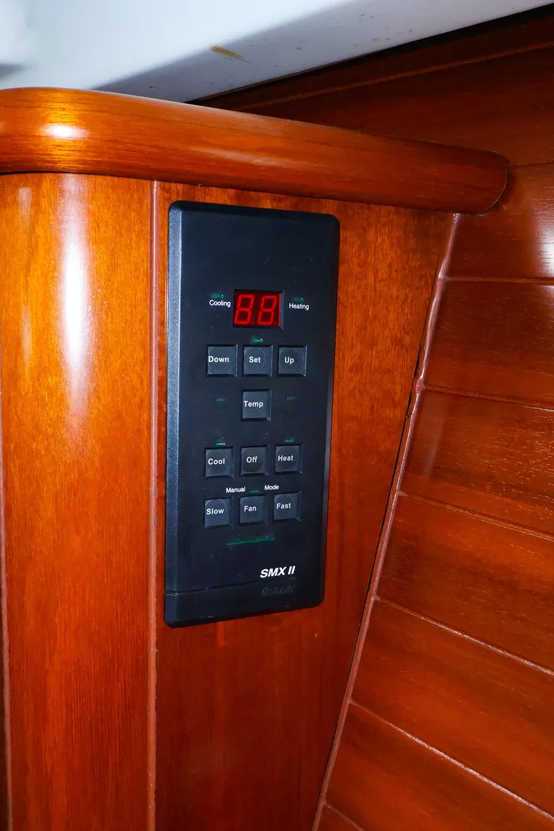 Slide: The Image of Control panel on 1999 Beneteau 361 yacht with wooden interior. - 35