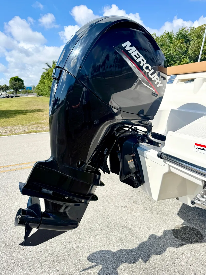 Slide: The Image of 2021 Bayliner VR5 OB with Mercury outboard motor, parked on a sunny day. - 26