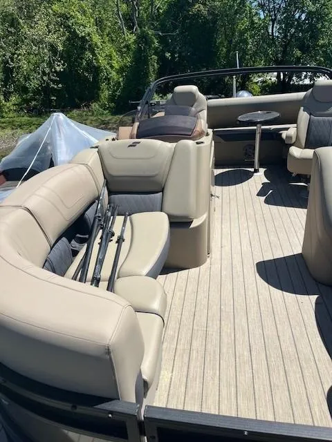 Slide: The Image of 2023 Starcraft SLS3 Q DH boat with beige seating and wooden deck. - 8