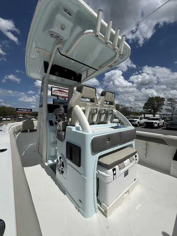 The Image of 2025 Key West 239 FSR boat on trailer under cloudy sky. - 1