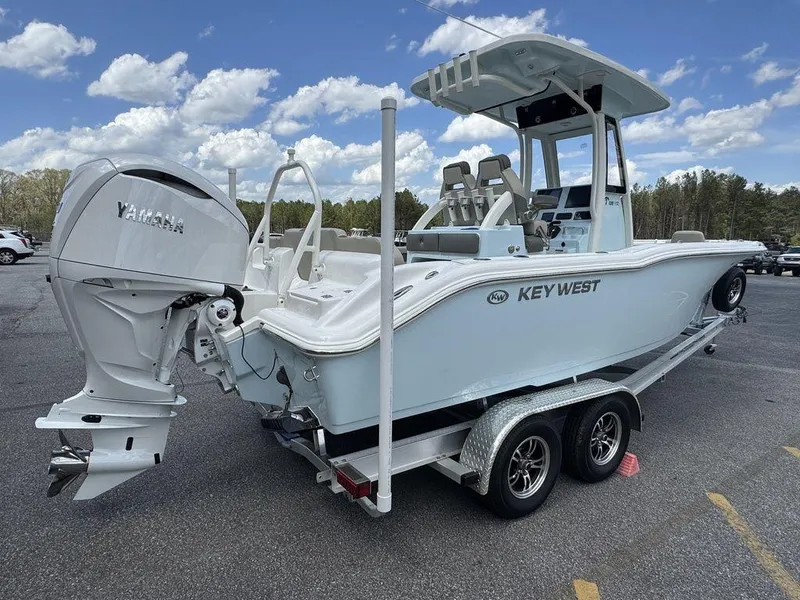 Slide: The Image of 2025 Key West 239 FSR boat with powerful outboard motor, rear view. - 5