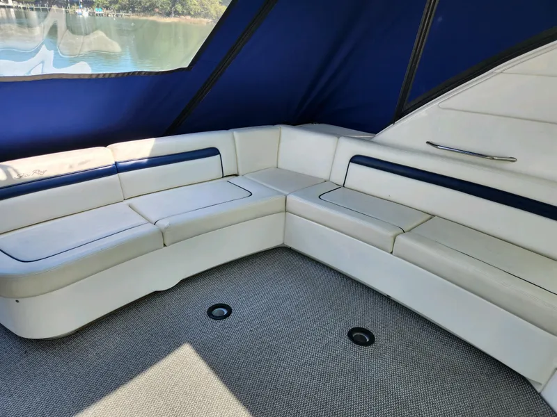 Slide: The Image of Luxurious seating area on 2011 Sea Ray 540 Sundancer yacht with blue and white upholstery. - 16