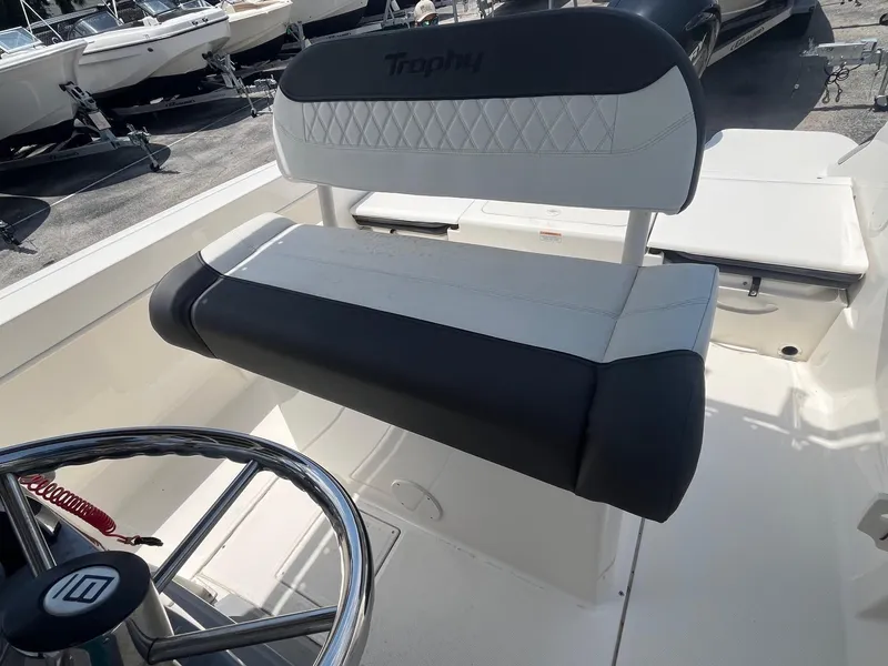 Slide: The Image of 2022 Bayliner Trophy T22CC boat seat and steering wheel, showcasing modern design and comfort. - 8