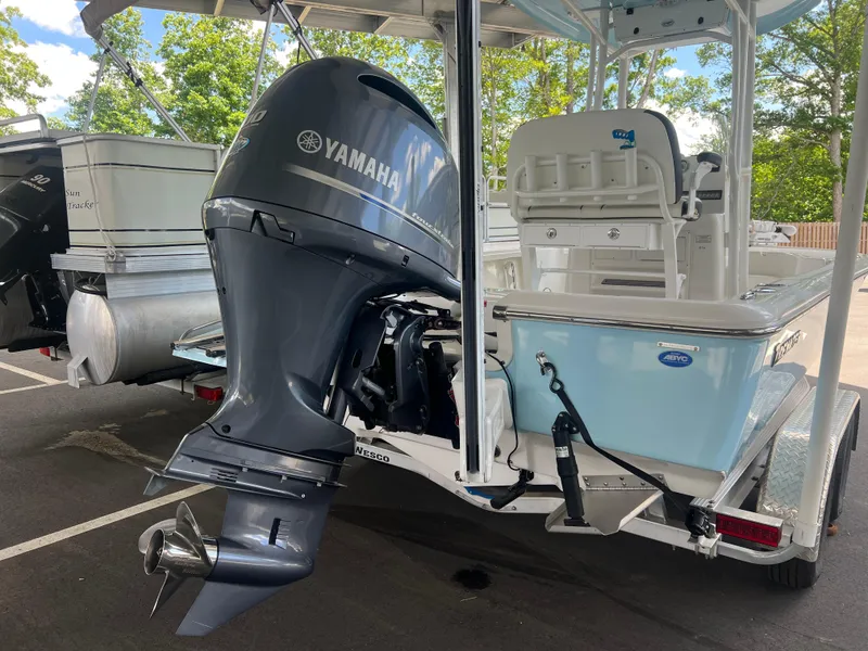 Slide: The Image of 2023 Tidewater 2110 boat with Yamaha outboard motor on trailer. - 7