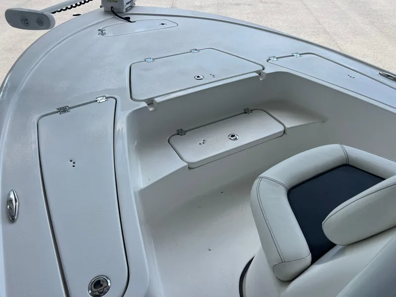 Slide: The Image of 2023 Tidewater 2110 boat interior with seating and storage compartments. - 8