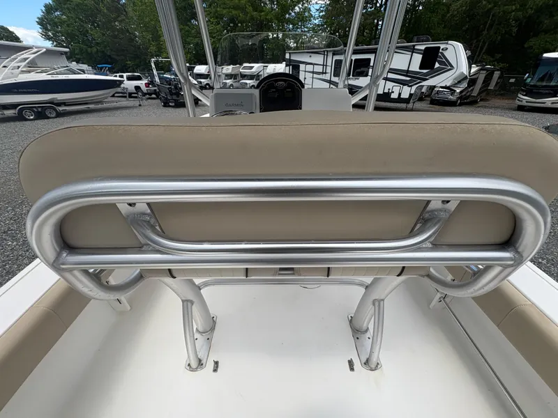 Slide: The Image of 2017 Sea Fox 206 Commander boat interior with beige seating and metal frame. - 12