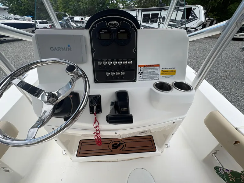 Slide: The Image of 2017 Sea Fox 206 Commander boat console with Garmin system and steering wheel. - 13