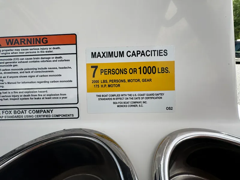 Slide: The Image of 2017 Sea Fox 206 Commander capacity label: 7 persons or 1000 lbs, 175 HP motor. - 16