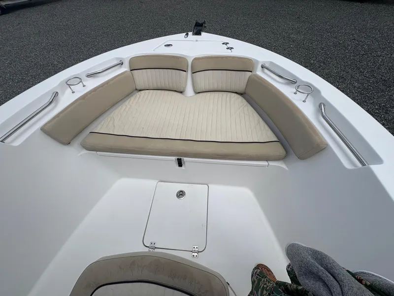 Slide: The Image of 2017 Sea Fox 206 Commander boat with cushioned seating and storage compartment. - 20