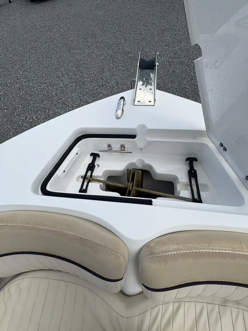 Slide: The Image of 2017 Sea Fox 206 Commander boat anchor compartment with beige seating. - 24