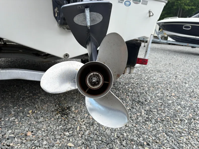 Slide: The Image of Propeller of a 2017 Sea Fox 206 Commander boat on gravel surface. - 4