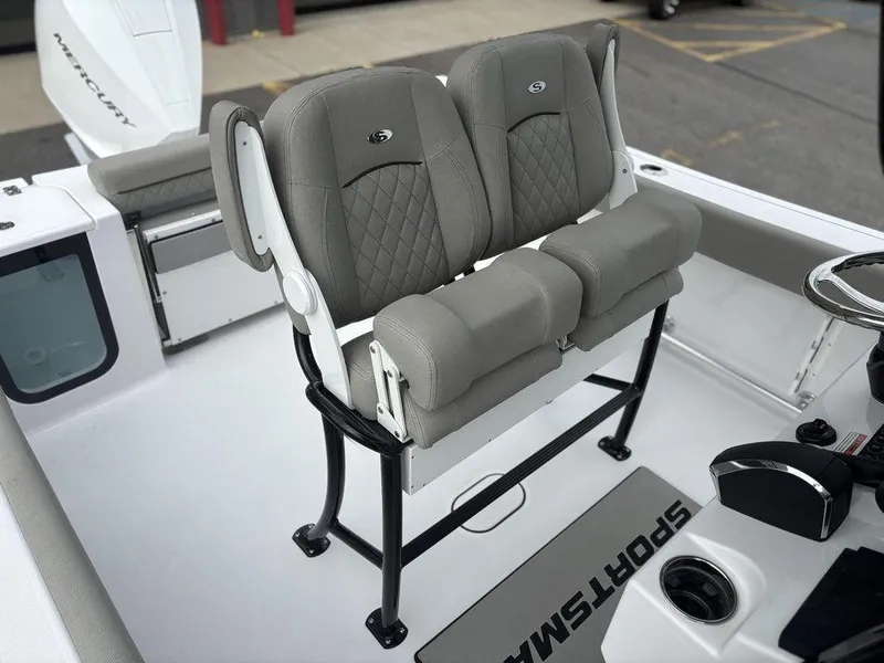 Slide: The Image of 2025 Sportsman Open 232 boat seating with gray cushioned seats and black frame. - 10