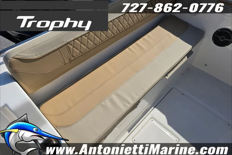 Slide: The Image of 2025 Trophy T22 SC boat seating with beige upholstery, Antonietti Marine branding. - 12
