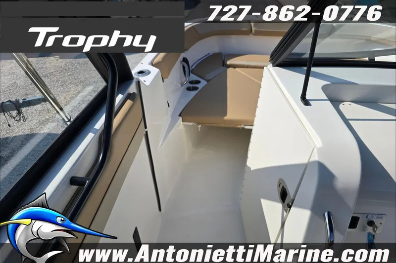 Slide: The Image of 2025 Trophy T22 SC boat engine detail with contact information and logo. - 34