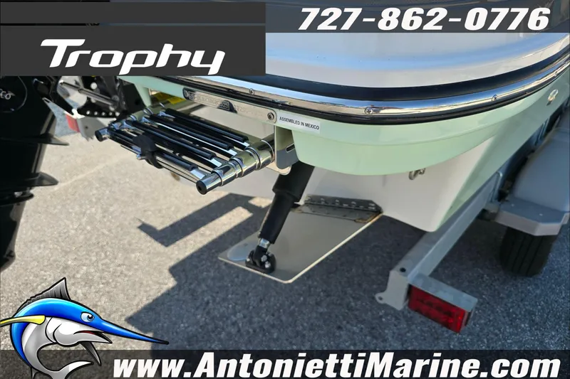 Slide: The Image of 2025 Trophy T22 SC boat interior with steering wheel and seating, showcased by Antonietti Marine. - 42