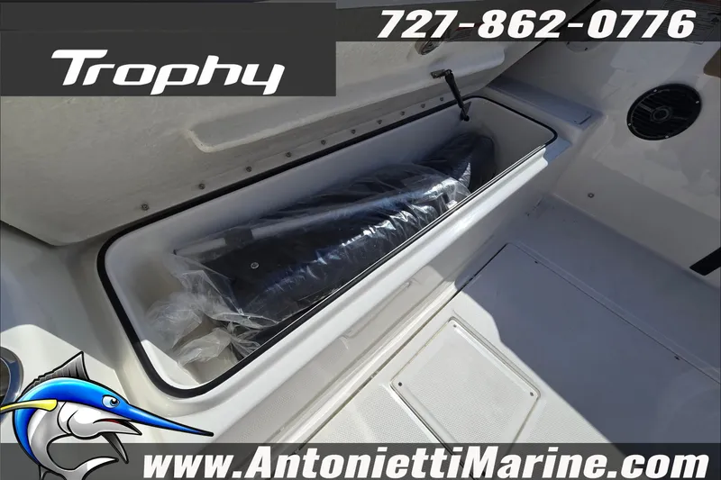 Slide: The Image of 2025 Trophy T22 SC boat interior with steering wheel and seating, Antonietti Marine branding. - 49