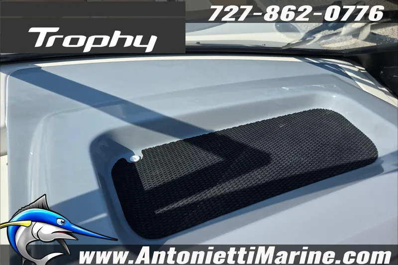 Slide: The Image of 2025 Trophy T22 SC boat interior with storage compartment, Antonietti Marine branding. - 55