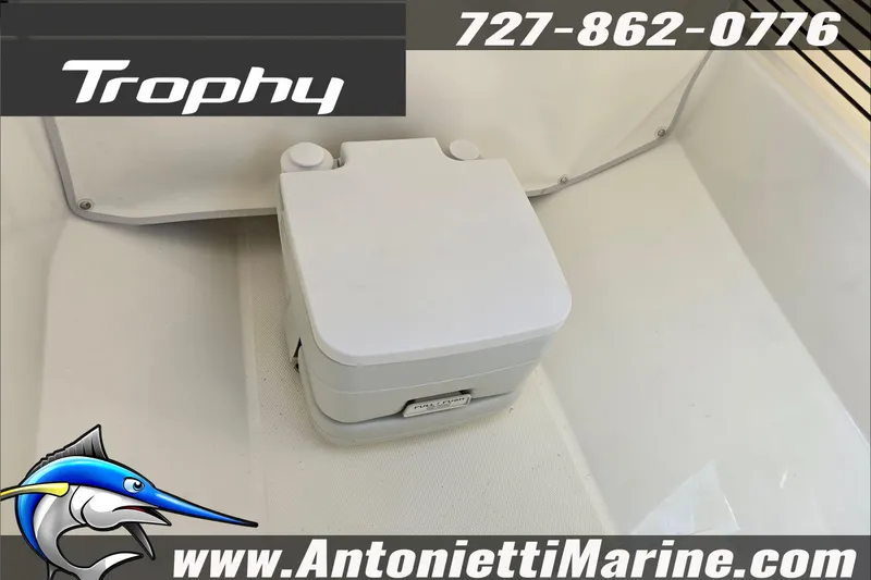 Slide: The Image of 2025 Trophy T22 SC boat side view with contact details and logo. - 73